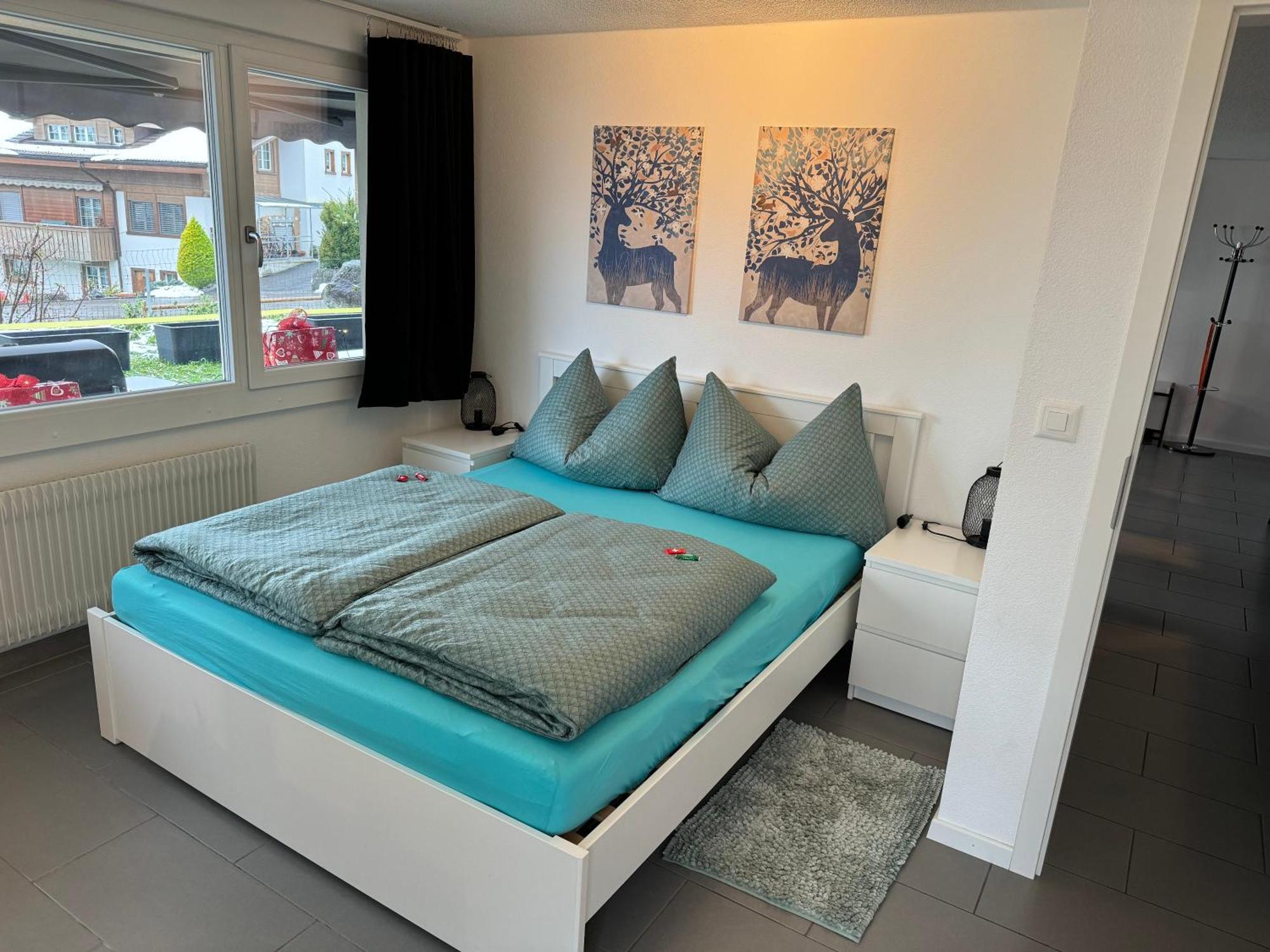 See Und Berge Garden Faulensee Bagian luar foto